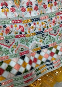 white multi pitch lehenga with f gift