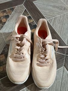 peach color sneakers