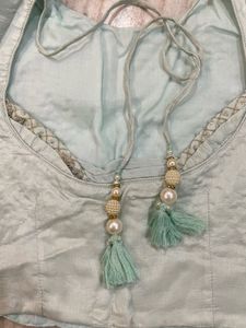 Elegant Mint Green Embellished Lehenga Choli