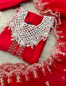 Elegant Red Kurta Set with Intricate White Necklin