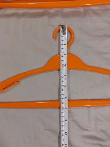 Set of 6 Orange Plastic Hangers