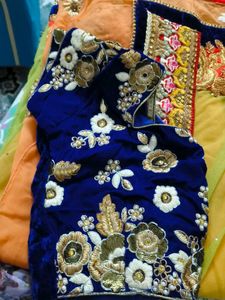 net embroidery saree with velvet blouse