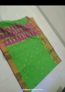 Vibrant Green Saree with Pink Border