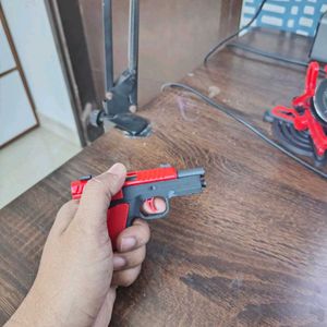 Toy Gun keychain  with blow back action- Red and B