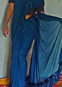 Stunning Teal Saree with Sequined Blouse