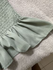 Smocked Tie-Strap Peplum Top