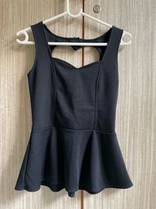 Chic Black Peplum Top with Heart Cutout