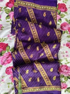 Vibrant Purple Saree with Gold Embroidery