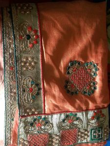 Elegant Peach Saree with Intricate Embroidery