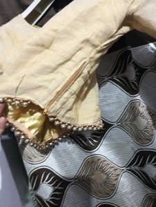 dark brown lehga with golden duppatta and blouse