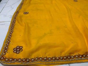 Beautiful Yellow pearl handwork saree