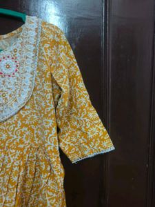 Yellow Printed Kurta with Neck Embellishment