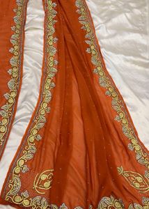 orange emblished saree