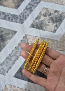 Set of 4 Gold Tone Bangles