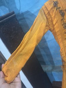 Yellow Embroidered Kurta with attached skirt style