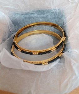 Avon Gold &amp; Black Beaded Bangles