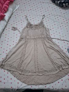sleeveless dress over jeans top
