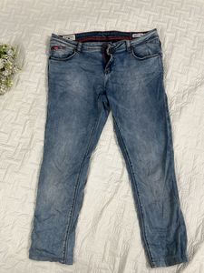 Light Wash Distressed Denim Jeans