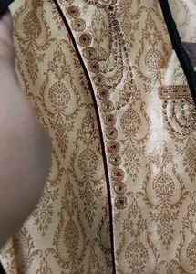 Sherwani- Golden With Maroon Highlights And Button