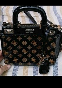Guess Monogram Sling Bag