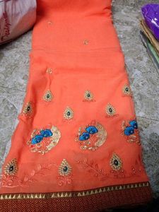 Elegant Orange Embroidered Saree