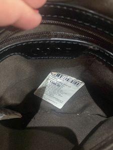 Handpurse With Tag Inside