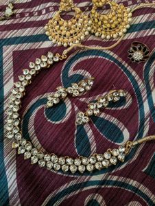combo of 2 sets ,1 ring and a glass pendant