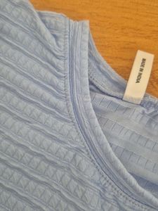 Cute Blue Textured Top with Flower Applique