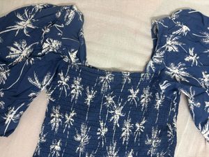 Blue Smocked Peplum Top