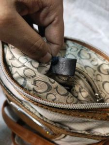 Authentic Guess snake patterned sling Bag