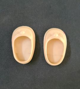 Off white shoes of a Doll from 1960s