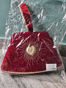 Elegant Red Velvet Clutch with Heart Design