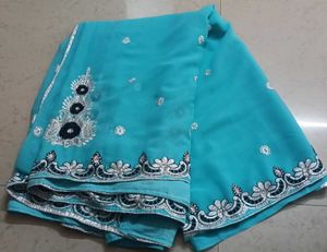 Turquoise Embroidered Saree