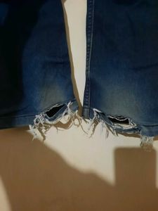 2 numbers of Distressed Blue Jeans