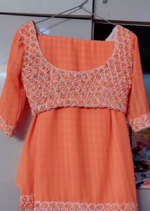 Elegant Peach Embroidered Saree