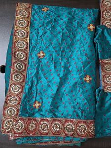 Teal Saree with 2 sleevless Blouse