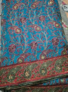 Beautiful Teal Embroidered Silk Saree