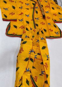 Beautiful Yellow Ethnic Dress with Crown and Flute