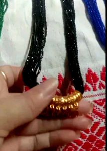 Elegant Black Beaded Necklace with Gold Pendant