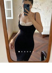 Sleek Black Spaghetti Strap Dress with Lace Trim