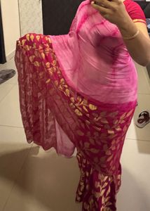 Elegant Pink Saree with Golden Motifs
