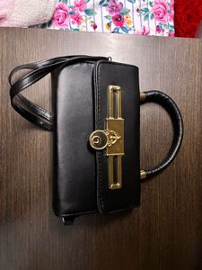 Chic Black Handbag with Gold Lock (Dubai product)