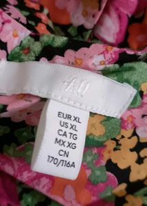 Vibrant Floral hulter neck top