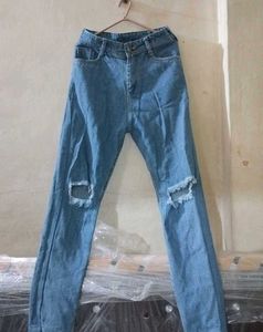 Ripped Blue Denim Jeans