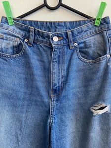 Torn high-waisted Wide Leg Jeans