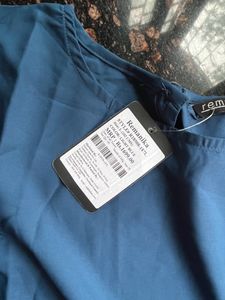 Blue top with cut work sleeves