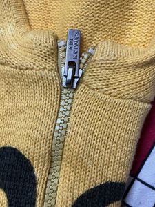 Yellow Zip-Up Hoodie with Graphic Print