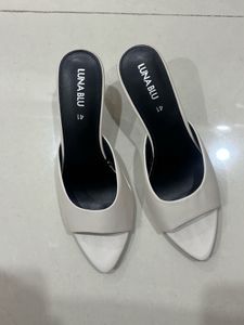 Elegant White Heeled Mules