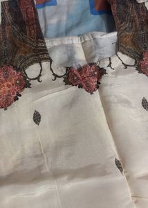 Elegant Cream Kurta Set with Tassels