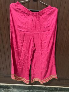 Vibrant Pink Palazzo Pants with Gold Trim